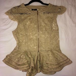 This is a beautiful detailed blouse